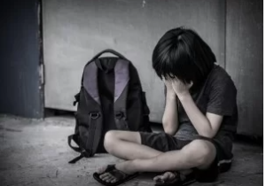 Image of despair, isolation as example of family violence impacts.